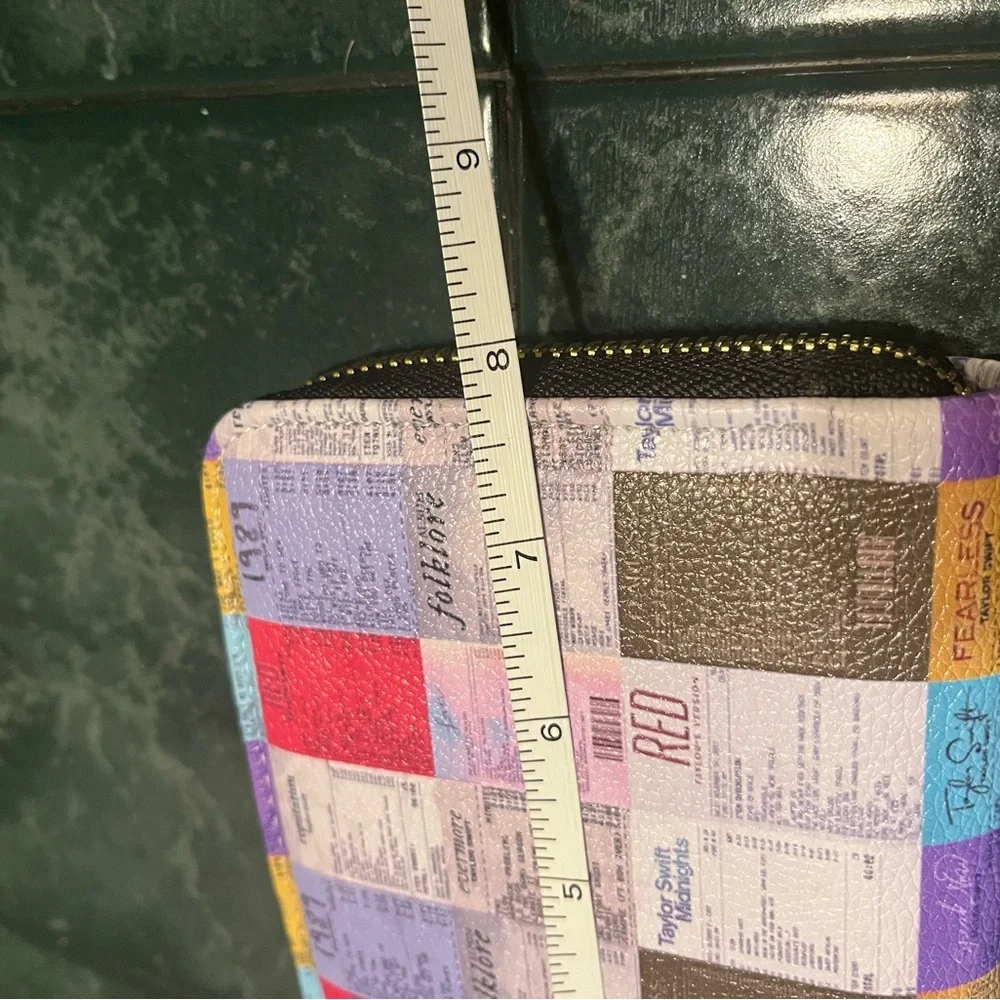 Taylor swift themed wallet.  Never used